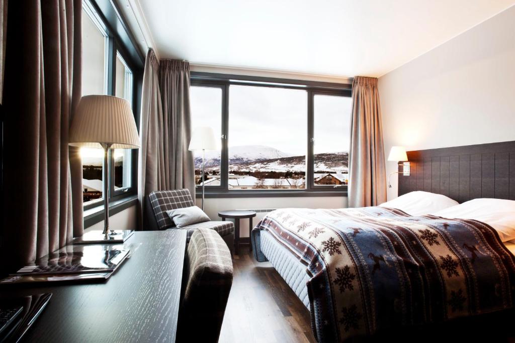Postel nebo postele na pokoji v ubytování Quality Hotel Skifer