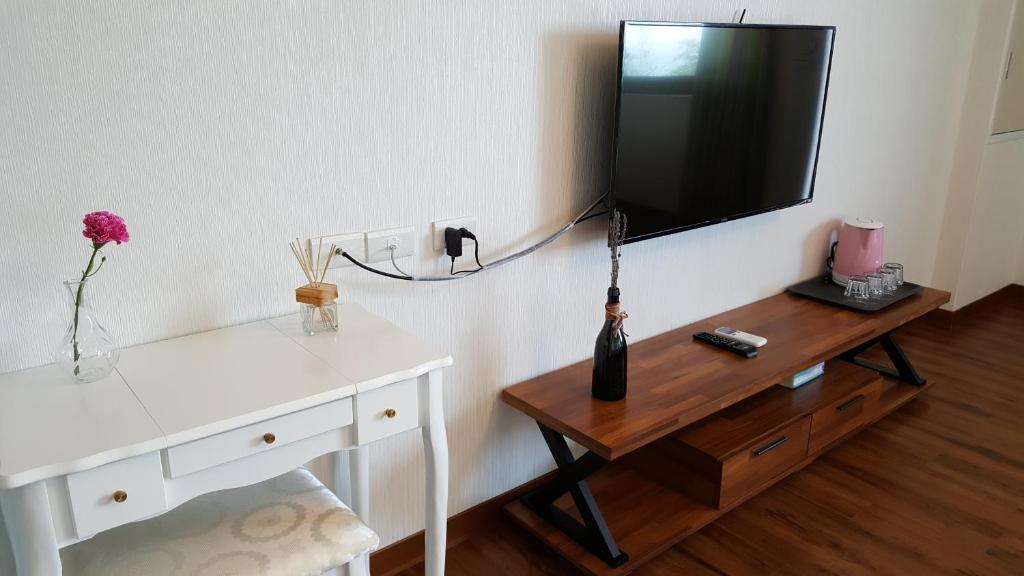 TV a/nebo společenská místnost v ubytování Chi House