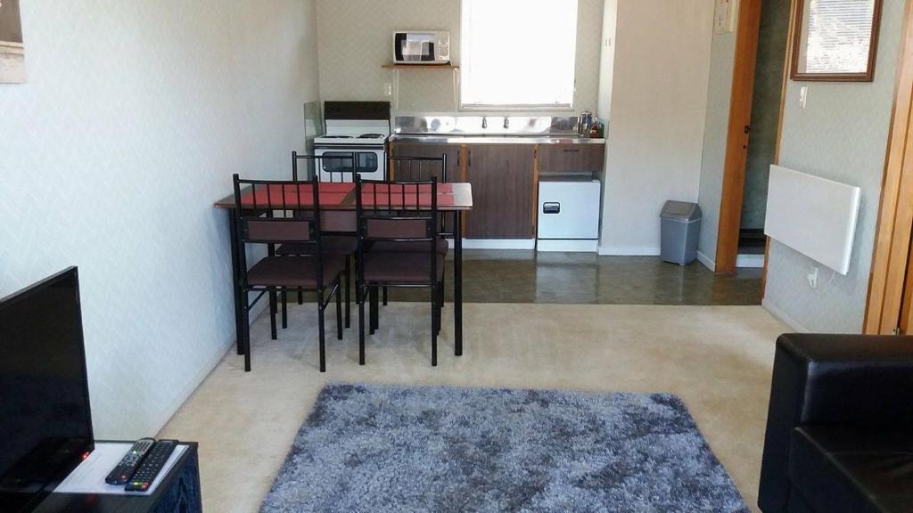 Kuchyň nebo kuchyňský kout v ubytování Pioneer Motel
