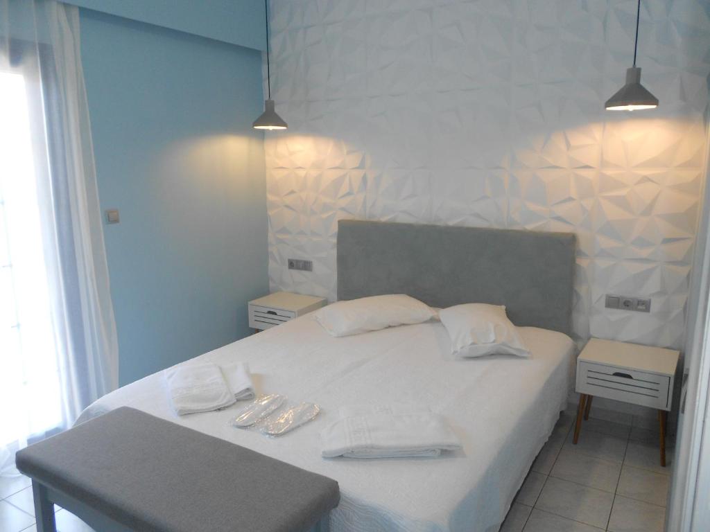 Voodi või voodid majutusasutuse Aggelos Hotel toas