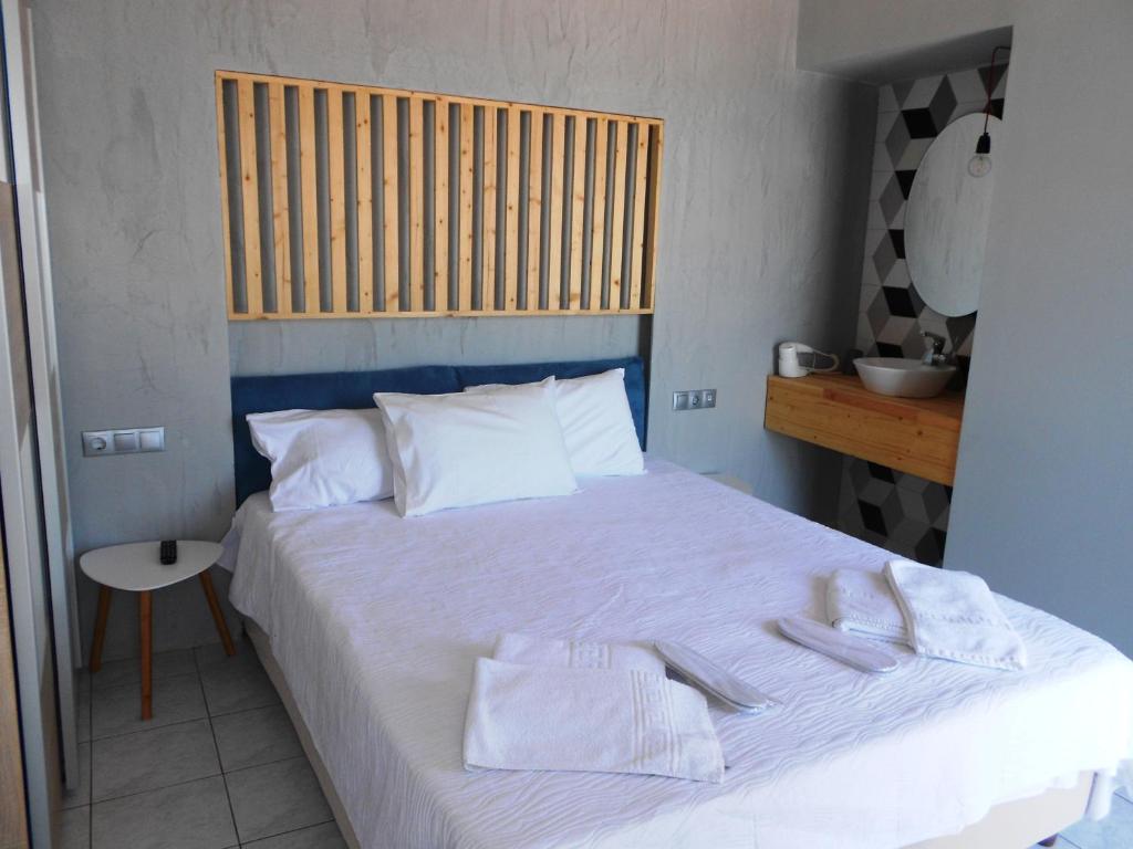 Voodi või voodid majutusasutuse Aggelos Hotel toas