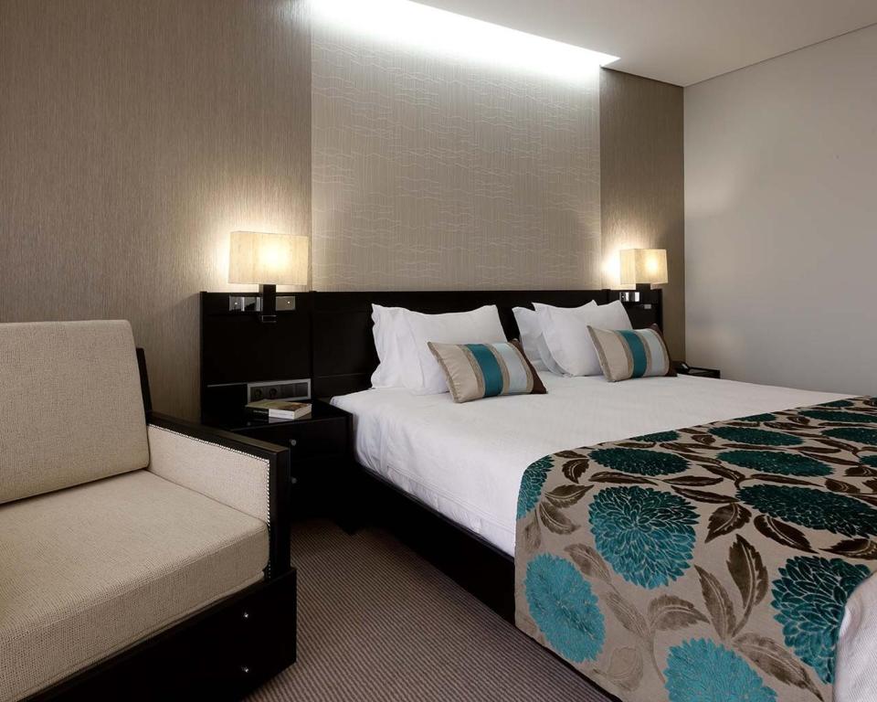 Postel nebo postele na pokoji v ubytování Cardal Hotel