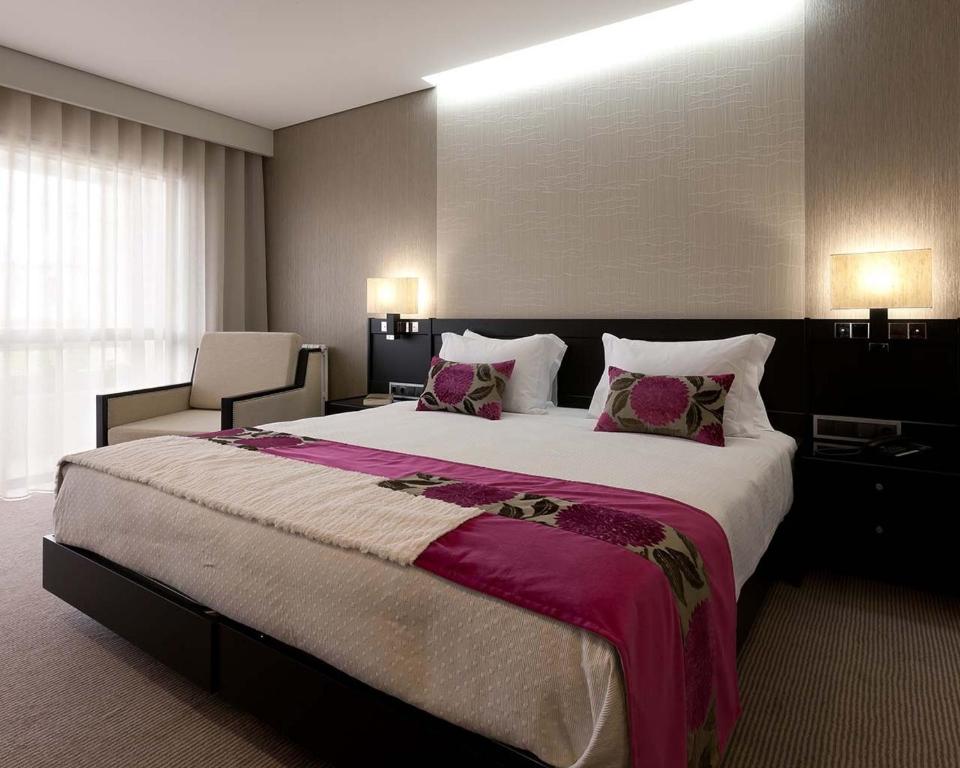 Postel nebo postele na pokoji v ubytování Cardal Hotel