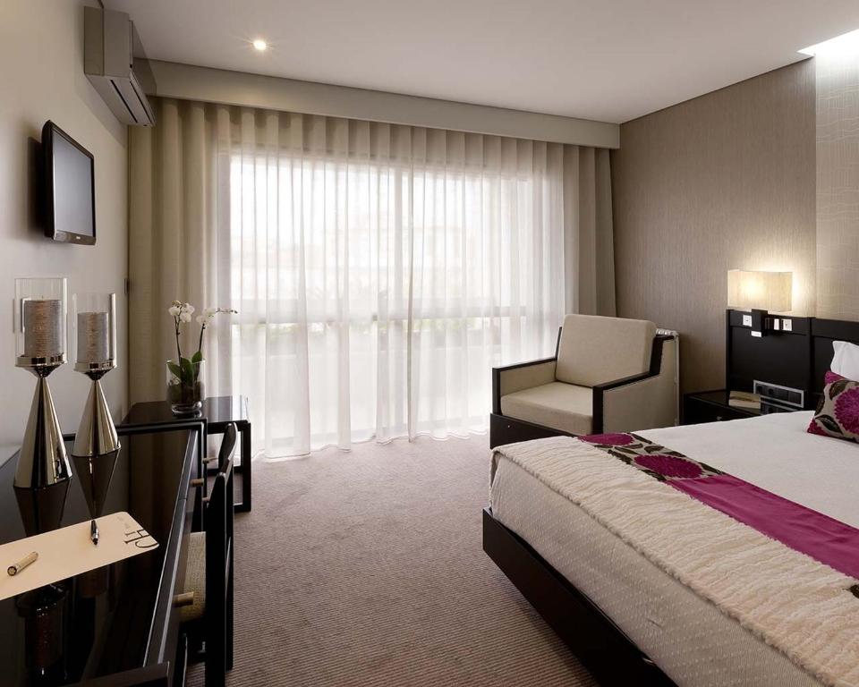 Postel nebo postele na pokoji v ubytování Cardal Hotel