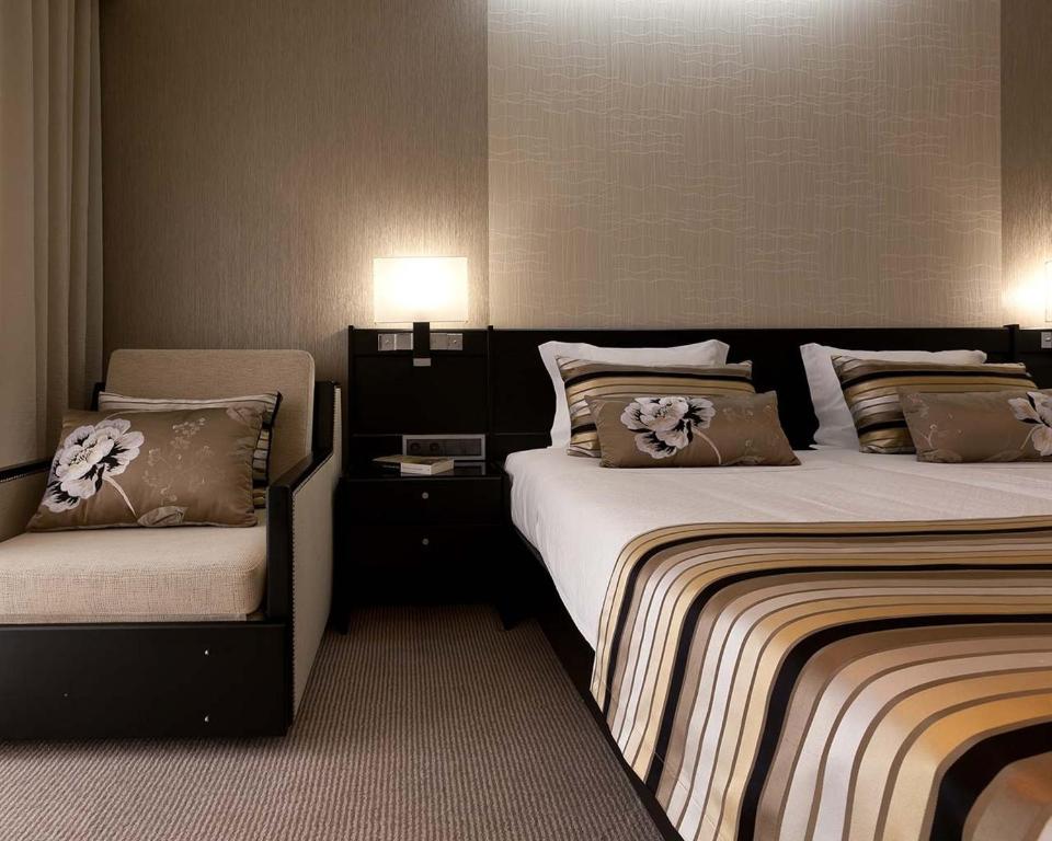 Postel nebo postele na pokoji v ubytování Cardal Hotel