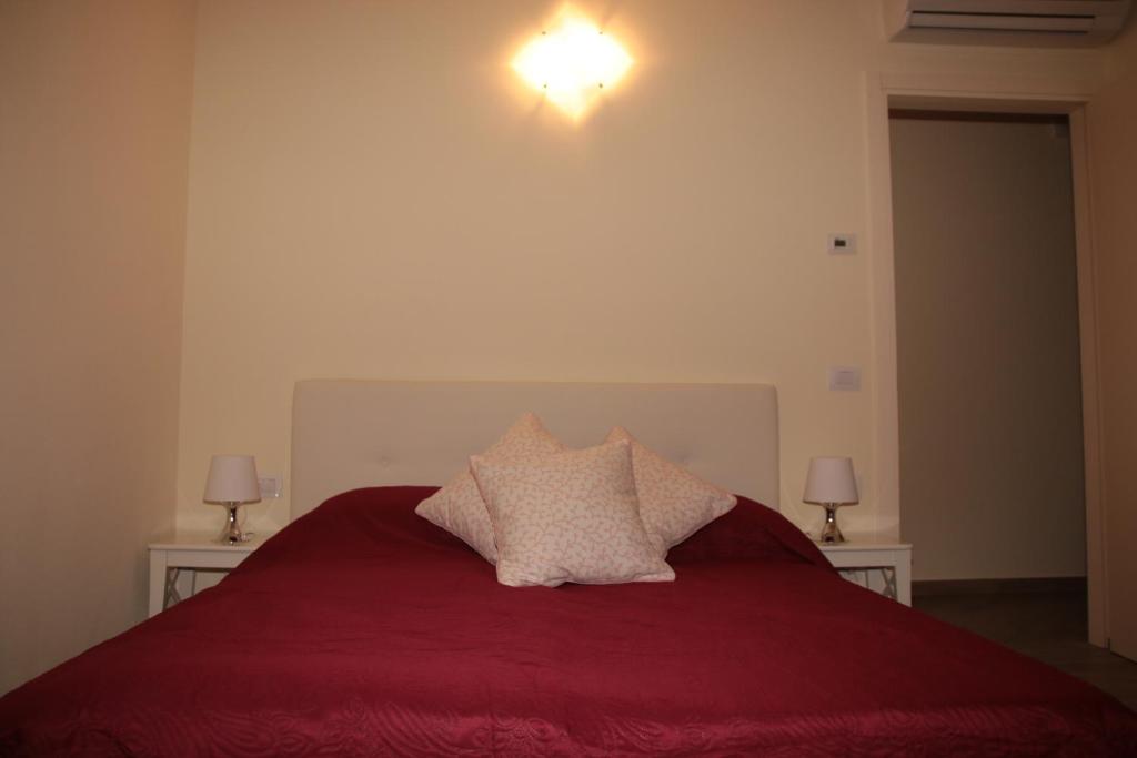 A bed or beds in a room at El Doorado