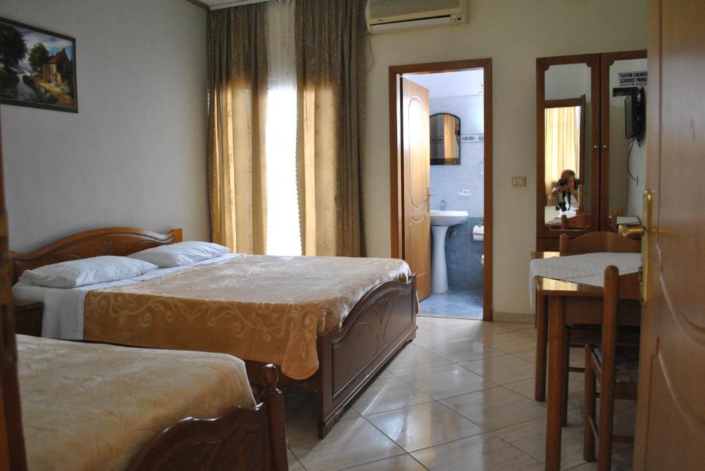 Postel nebo postele na pokoji v ubytování Eden Hotel