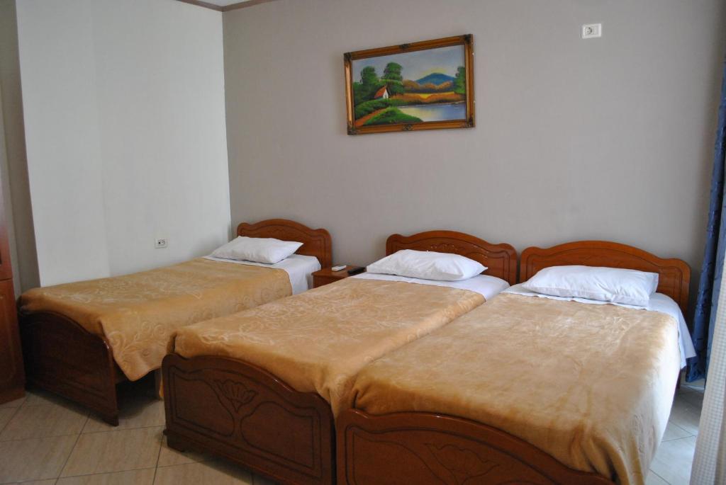 Postel nebo postele na pokoji v ubytování Eden Hotel