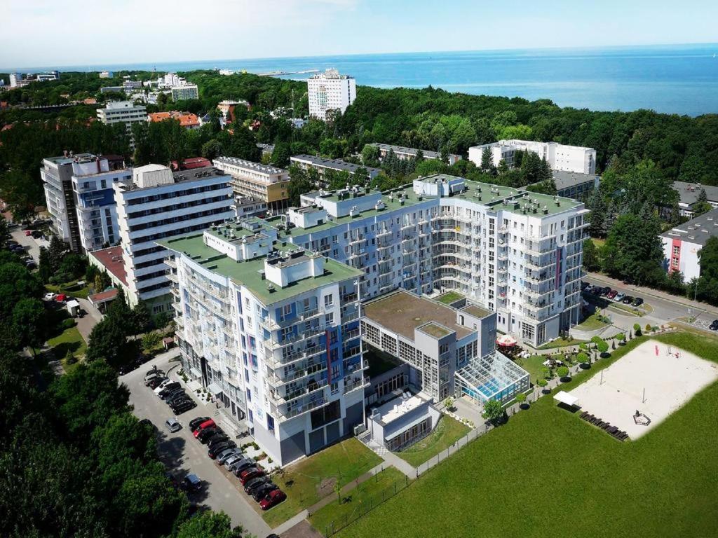 an aerial view of a city with tall buildings at ApartamentyPrzyMorzu Diva 553 in Kołobrzeg