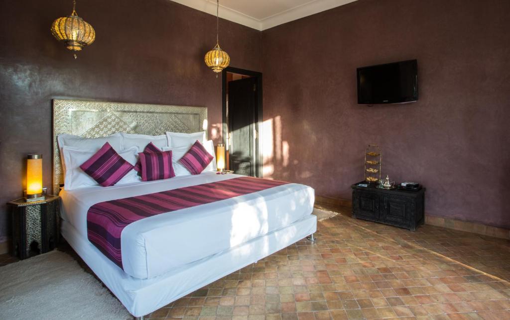 Postel nebo postele na pokoji v ubytování Riad Jawad & Spa
