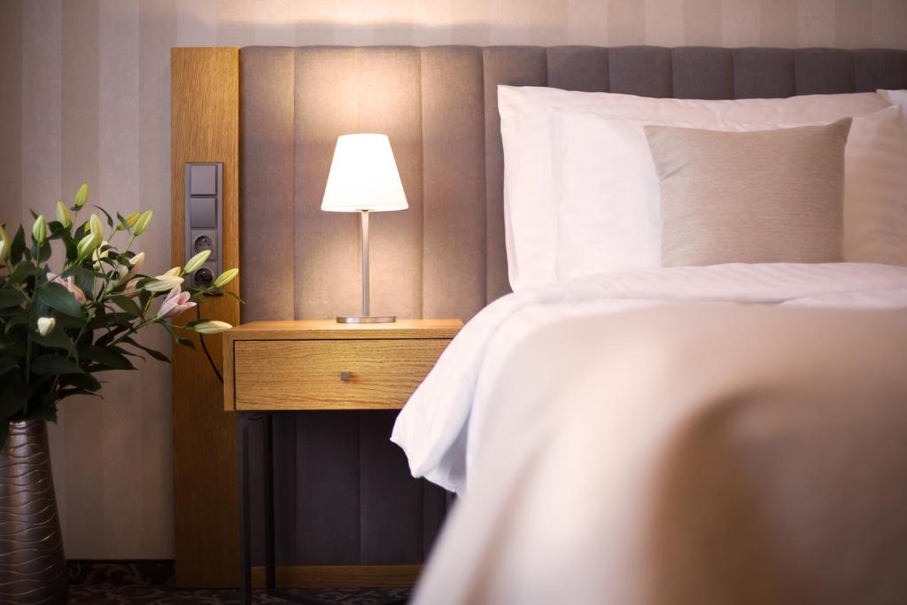 Łóżko lub łóżka w pokoju w obiekcie Hotel Schwaiger
