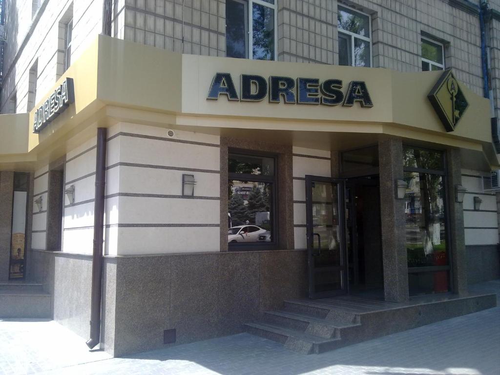 an office building with a sign that reads abresasia at Hotel Apartments Adresa in Chişinău