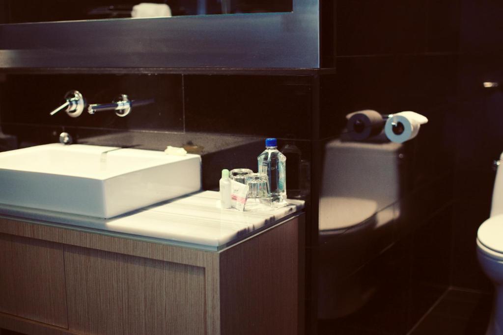 Koupelna v ubytování Hotel Ocho