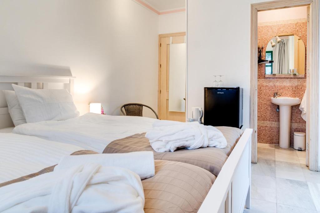 Postel nebo postele na pokoji v ubytování Hostal Alegre