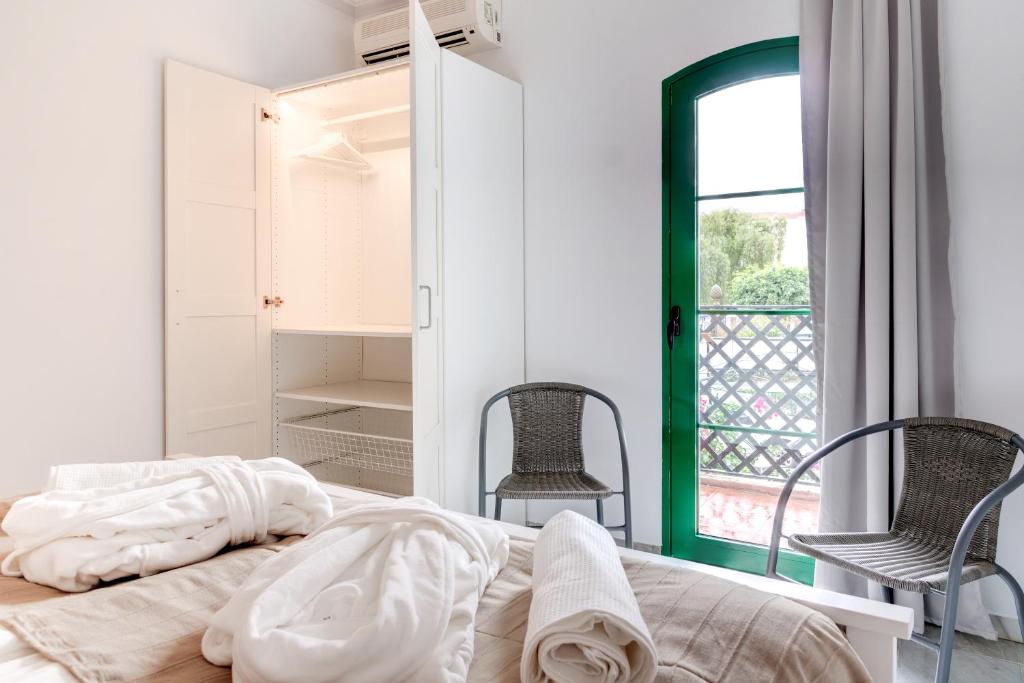Postel nebo postele na pokoji v ubytování Hostal Alegre