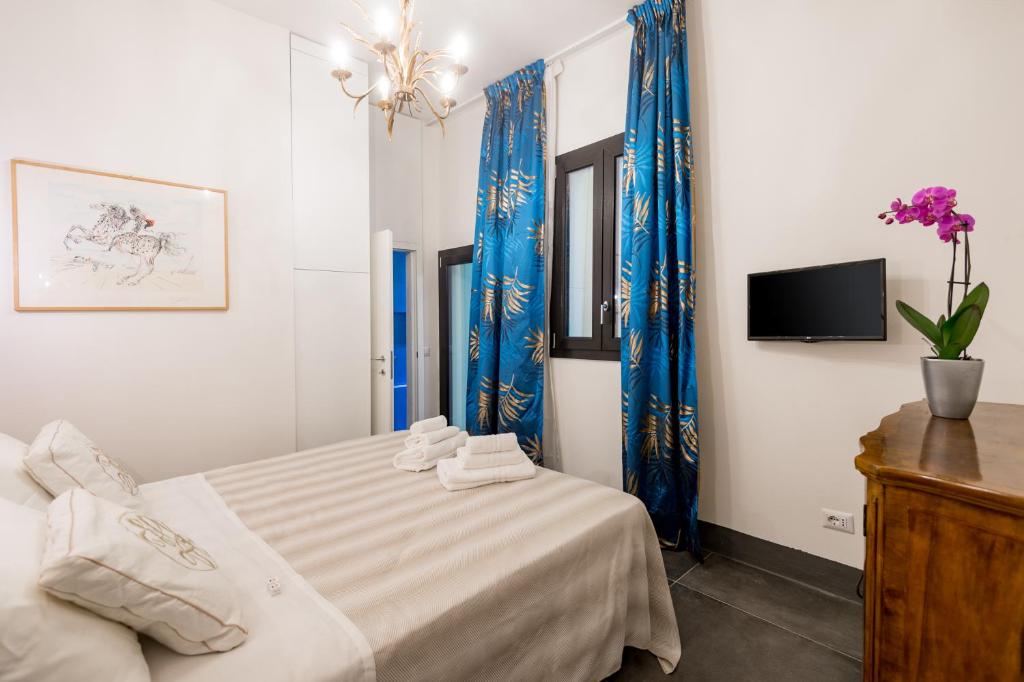 Łóżko lub łóżka w pokoju w obiekcie L'8 Boutique Design Apartments