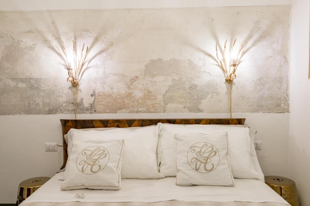 Łóżko lub łóżka w pokoju w obiekcie L'8 Boutique Design Apartments
