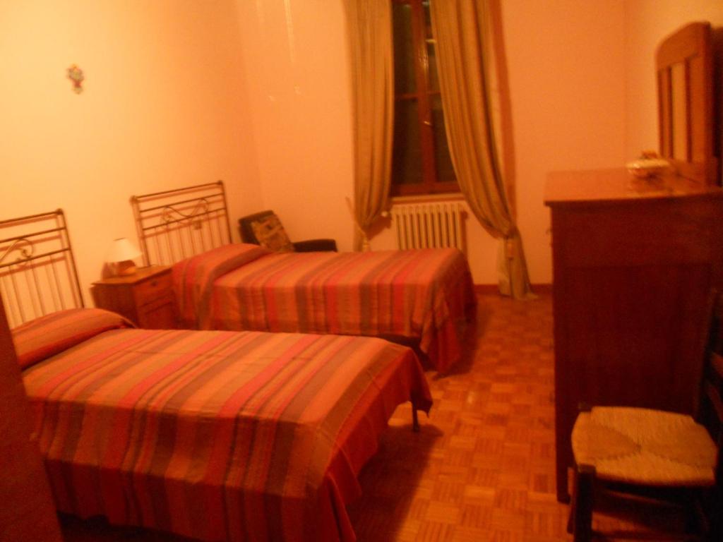 A bed or beds in a room at Agriturismo Boaria Bassa