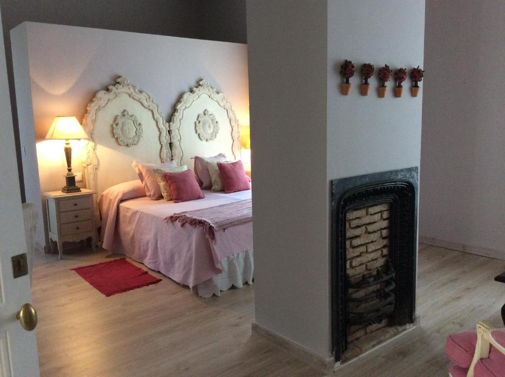 Cama o camas de una habitación en Finca La Favorita- Suites