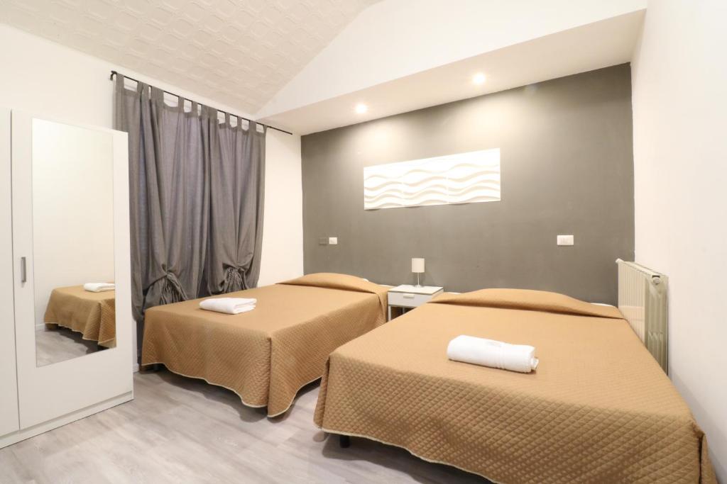Letto o letti in una camera di Guest House Minas
