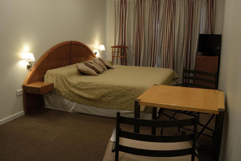 Postel nebo postele na pokoji v ubytování Apart Hotel Maue