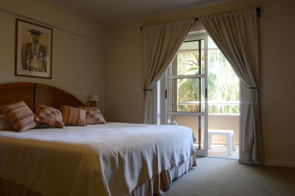 Postel nebo postele na pokoji v ubytování Apart Hotel Maue