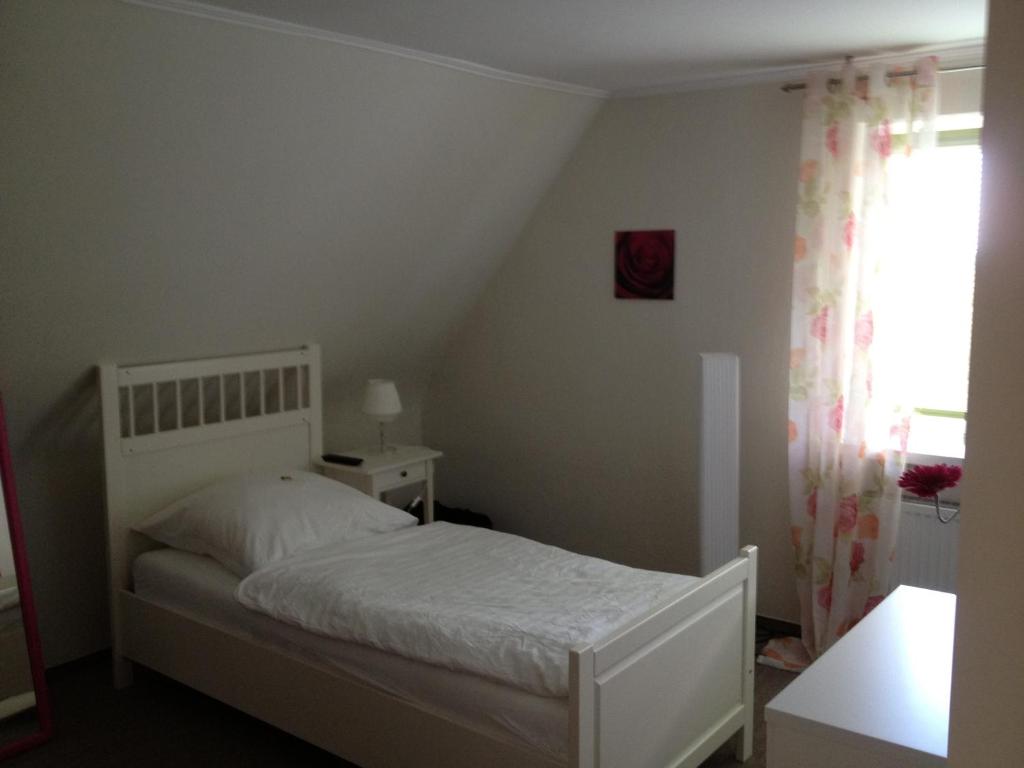 Postel nebo postele na pokoji v ubytování Gästehaus Graul