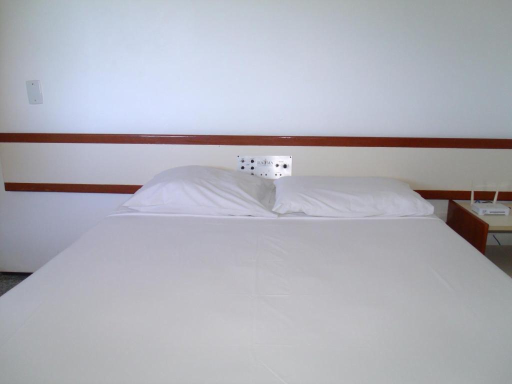 Voodi või voodid majutusasutuse Iracema Residence Hotel Flat toas