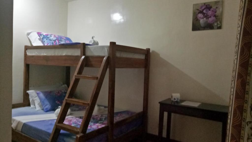 Postel nebo postele na pokoji v ubytování Jvhaven Pension