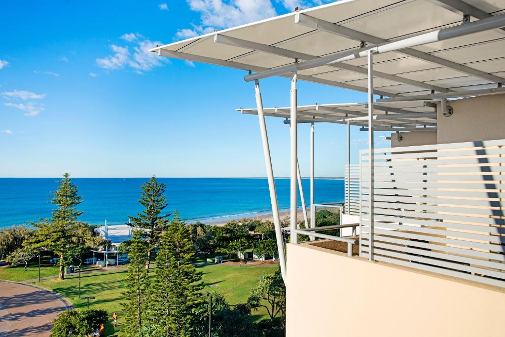 a view of the ocean from the balcony of a house at ULTIQA Shearwater Resort in Caloundra