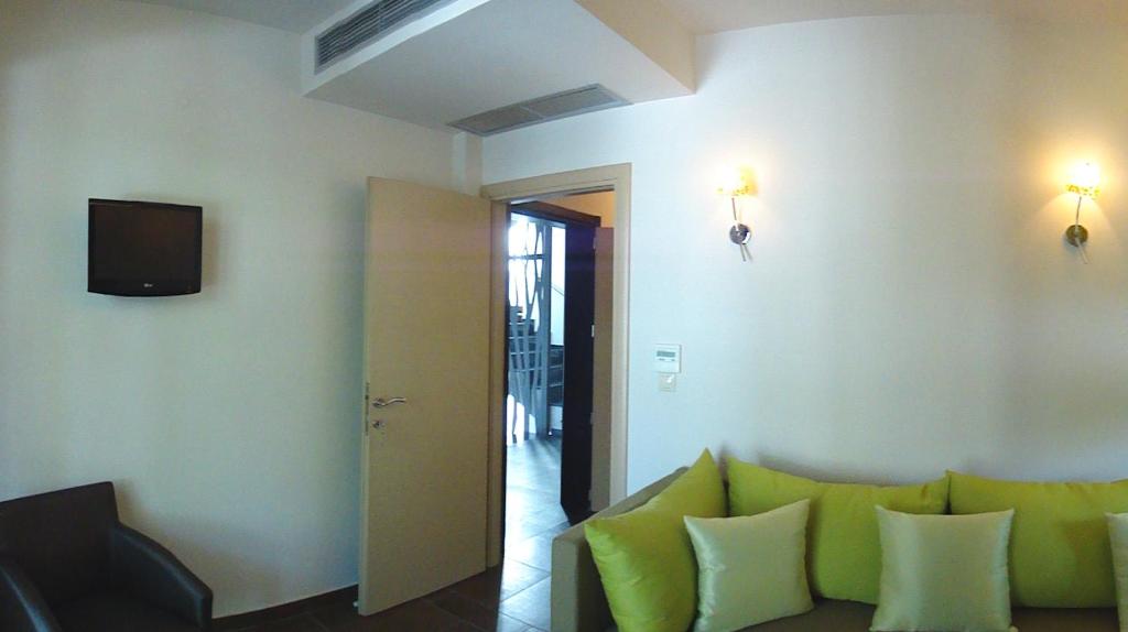 TV a/nebo společenská místnost v ubytování Hotel Ifigenia
