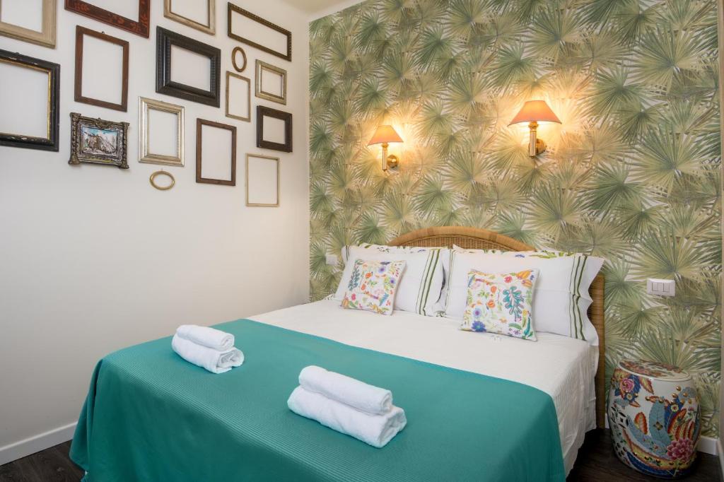 Łóżko lub łóżka w pokoju w obiekcie L'8 Boutique Design Apartments