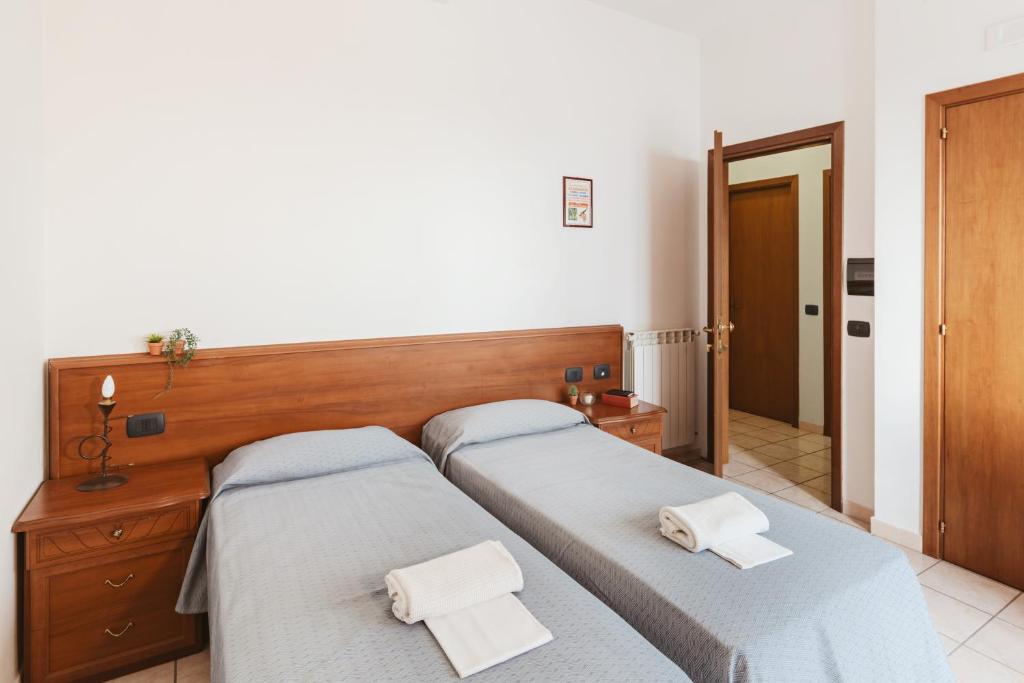 Postel nebo postele na pokoji v ubytování Hotel Bellavista