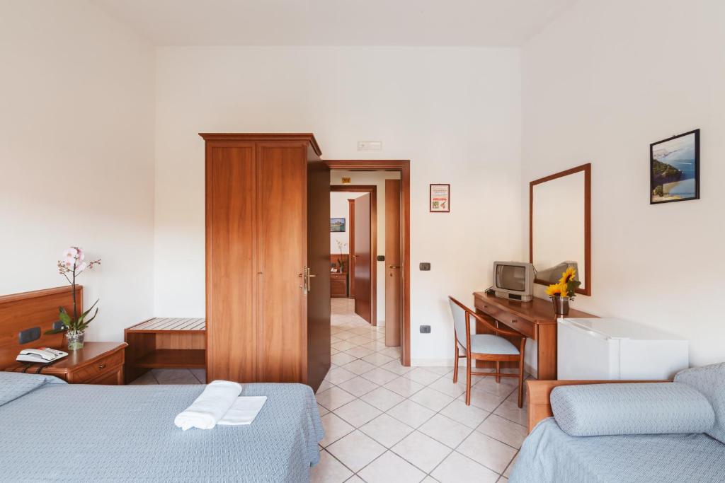 Postel nebo postele na pokoji v ubytování Hotel Bellavista