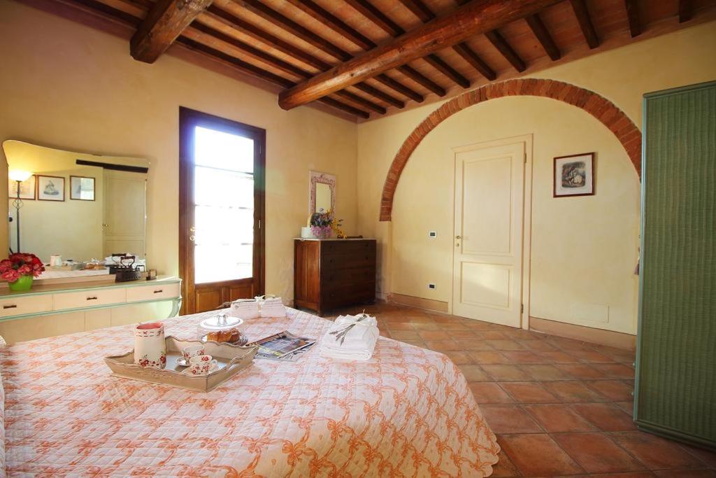 Postel nebo postele na pokoji v ubytování Agriturismo Le Querce