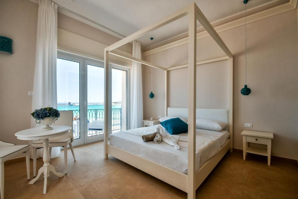 Postel nebo postele na pokoji v ubytování B&b Lungomare Otranto