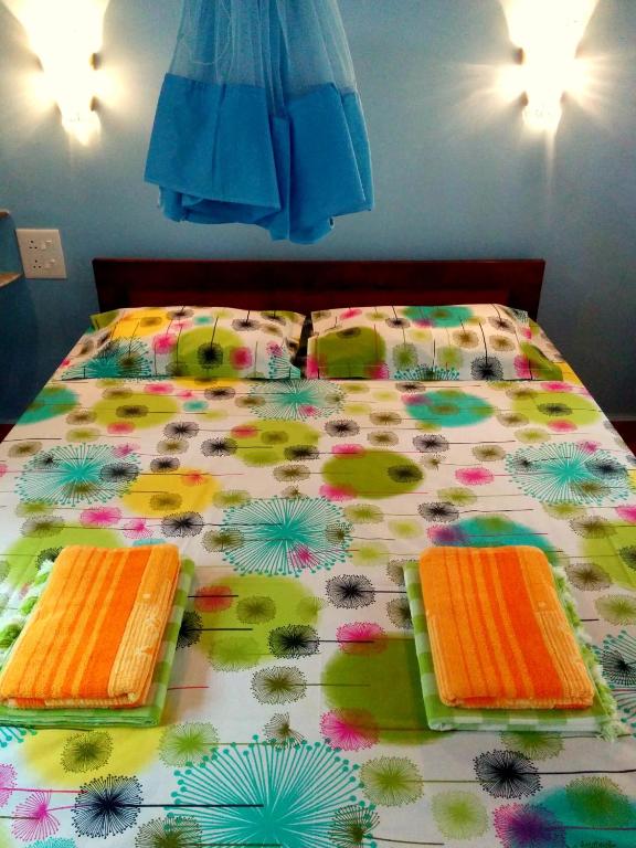 Letto o letti in una camera di Avalon Inn