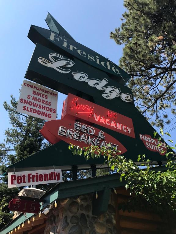 a bunch of signs on top of a restaurant at Fireside Lodge in South Lake Tahoe