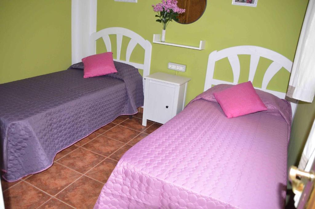 Postel nebo postele na pokoji v ubytování VIVIENDA VACACIONAL Casa Tajinaste