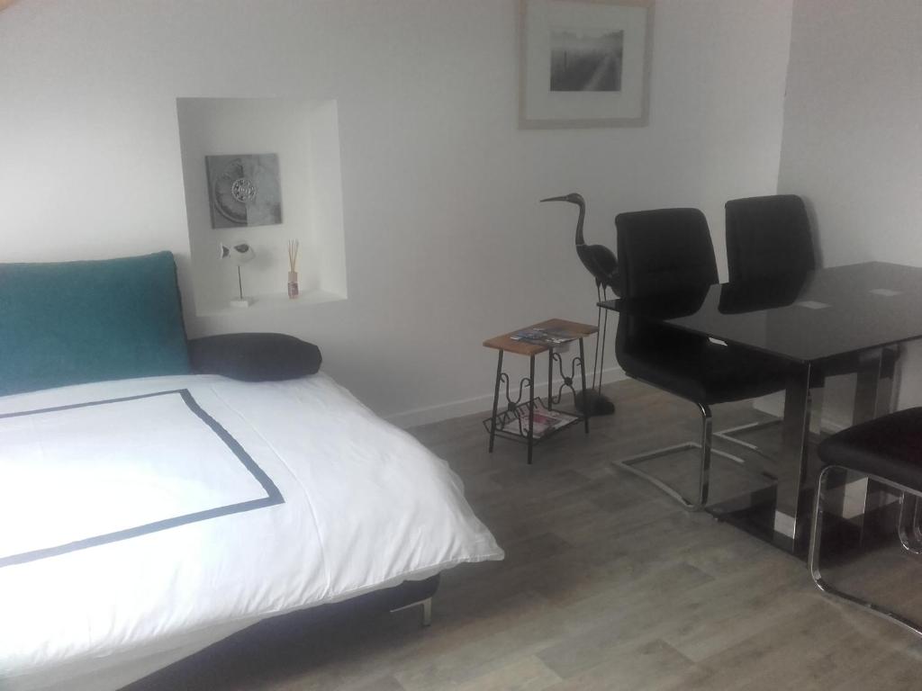 Postel nebo postele na pokoji v ubytování Aparthouse HAAS41 - Eupen