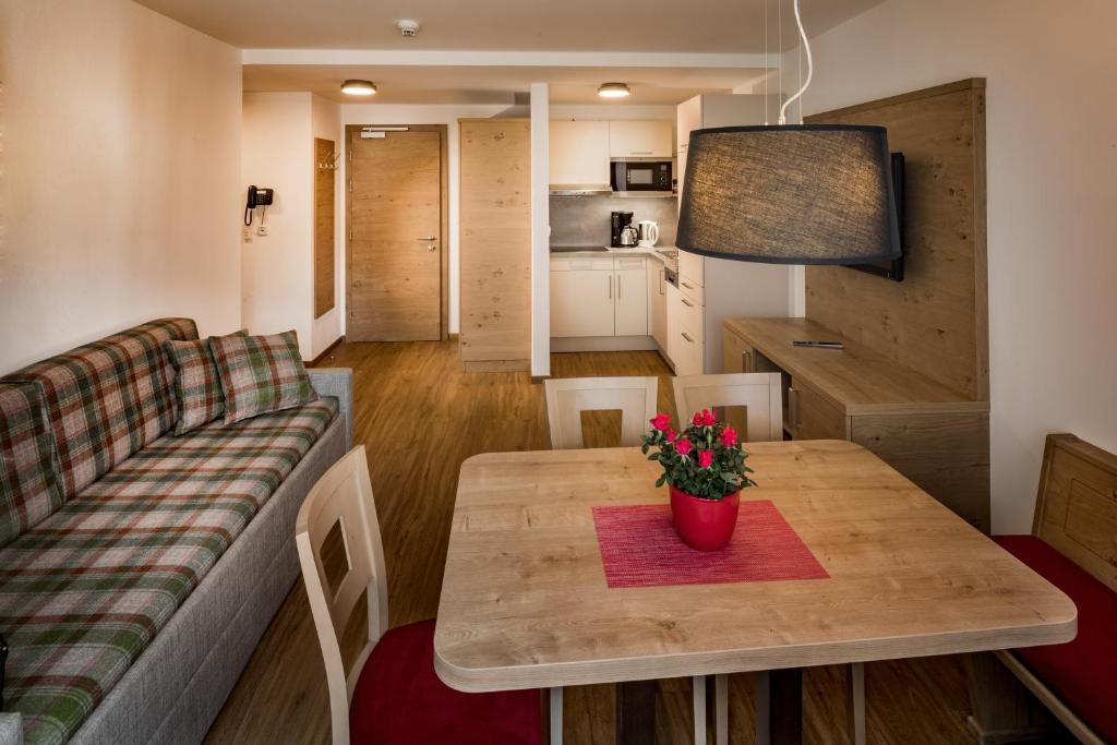 TV a/nebo společenská místnost v ubytování Appartements Hubenhof