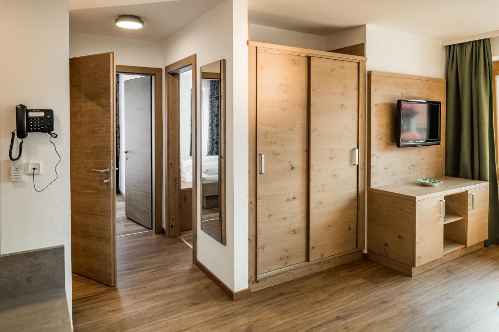 TV a/nebo společenská místnost v ubytování Appartements Hubenhof