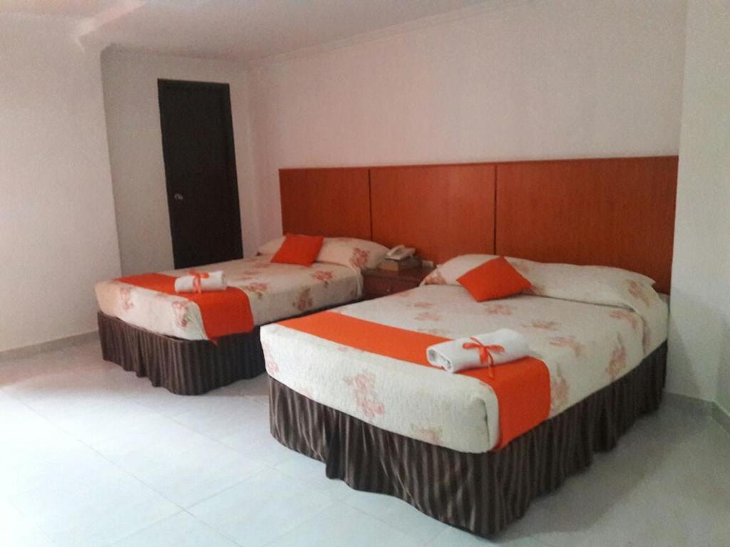 Postel nebo postele na pokoji v ubytování Hotel Via Espana