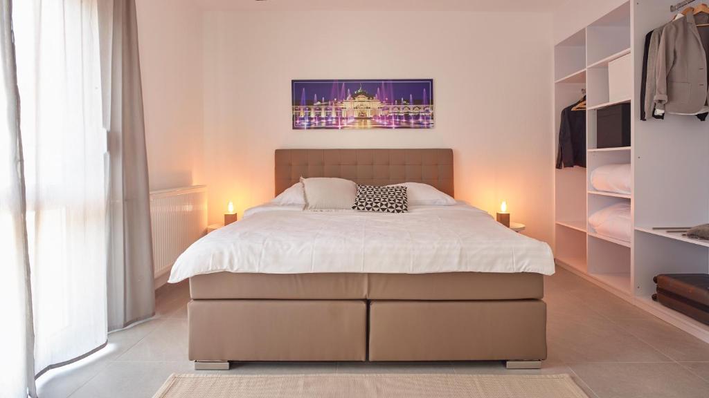 Postel nebo postele na pokoji v ubytování City Hotel ApartW3 - kostenlos parken