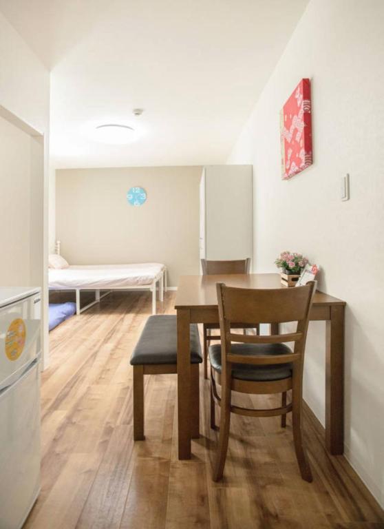 Postel nebo postele na pokoji v ubytování Osaka Tsuruhashitei Hotel Asahi group 大阪鶴橋亭ホテル