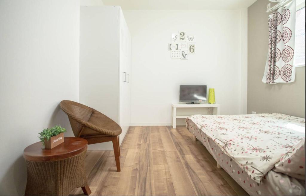 Postel nebo postele na pokoji v ubytování Osaka Tsuruhashitei Hotel Asahi group 大阪鶴橋亭ホテル