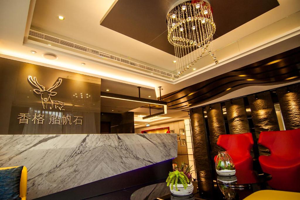 Postel nebo postele na pokoji v ubytování Siangge Chuanfan Rock Resort