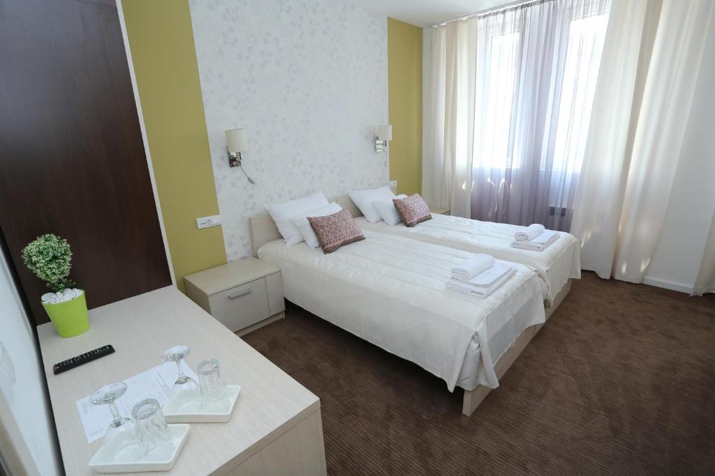 Postel nebo postele na pokoji v ubytování Konačište Grad B&B