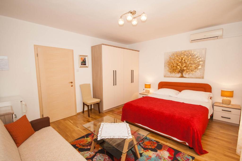 Posteľ alebo postele v izbe v ubytovaní Rooms Nadica
