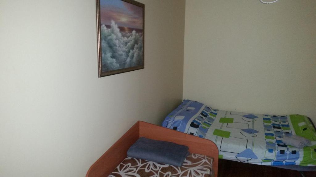 Postel nebo postele na pokoji v ubytování Little Amber Apartments